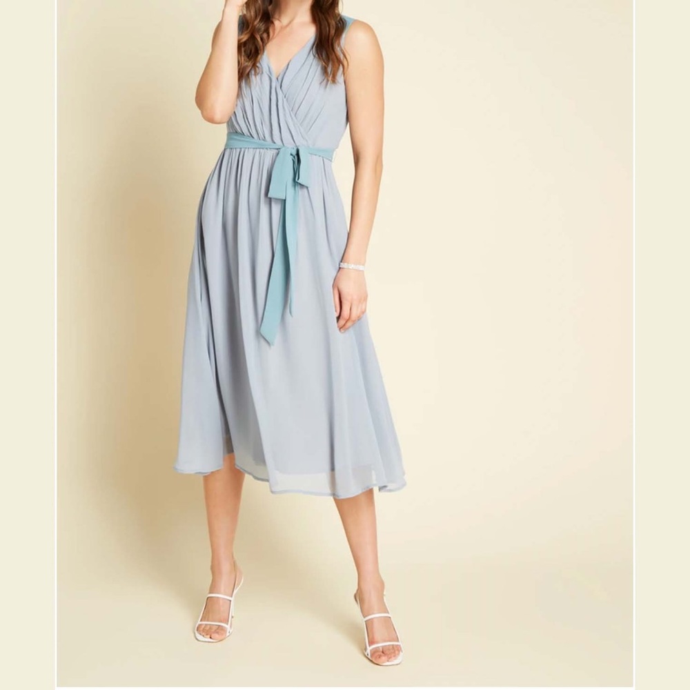 Blue midi dress with teal color blocks shoulders and sash. Never worn with tags.